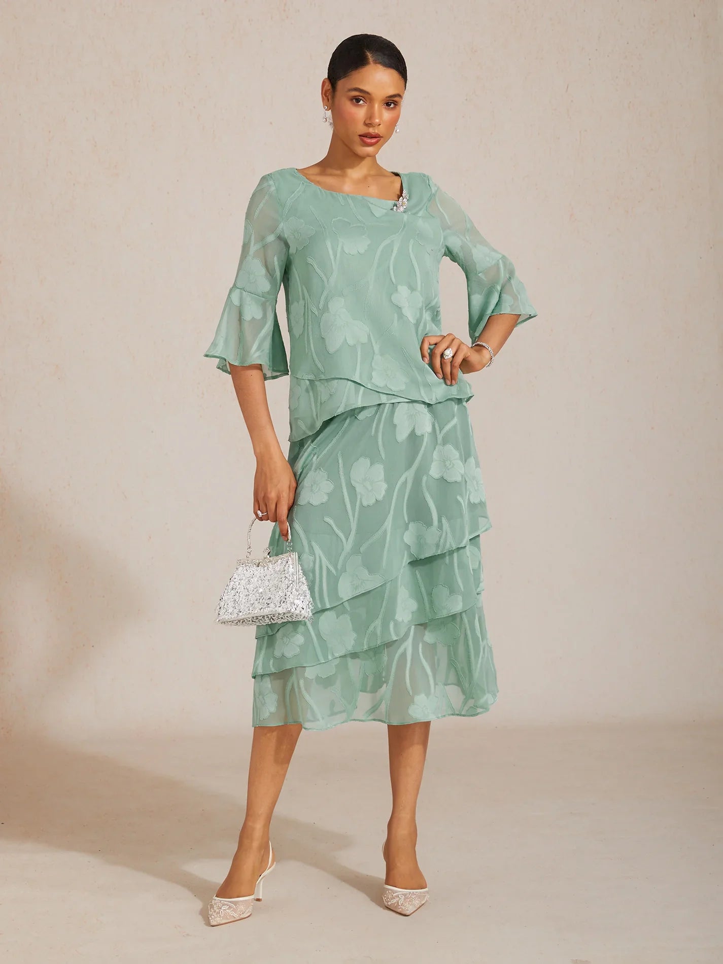Blouse en chiffon avec des bords asymétriques