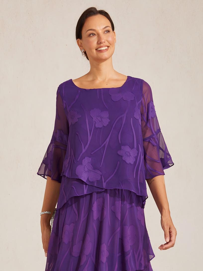 Blouse en chiffon avec des bords asymétriques élégants