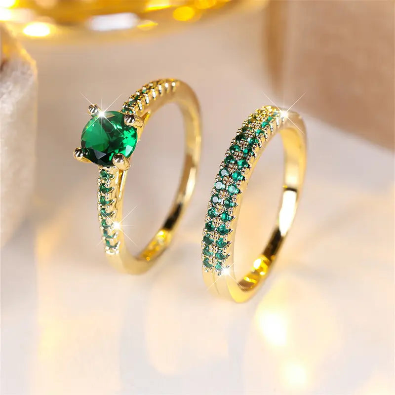 Bague double avec pierre émeraude en or