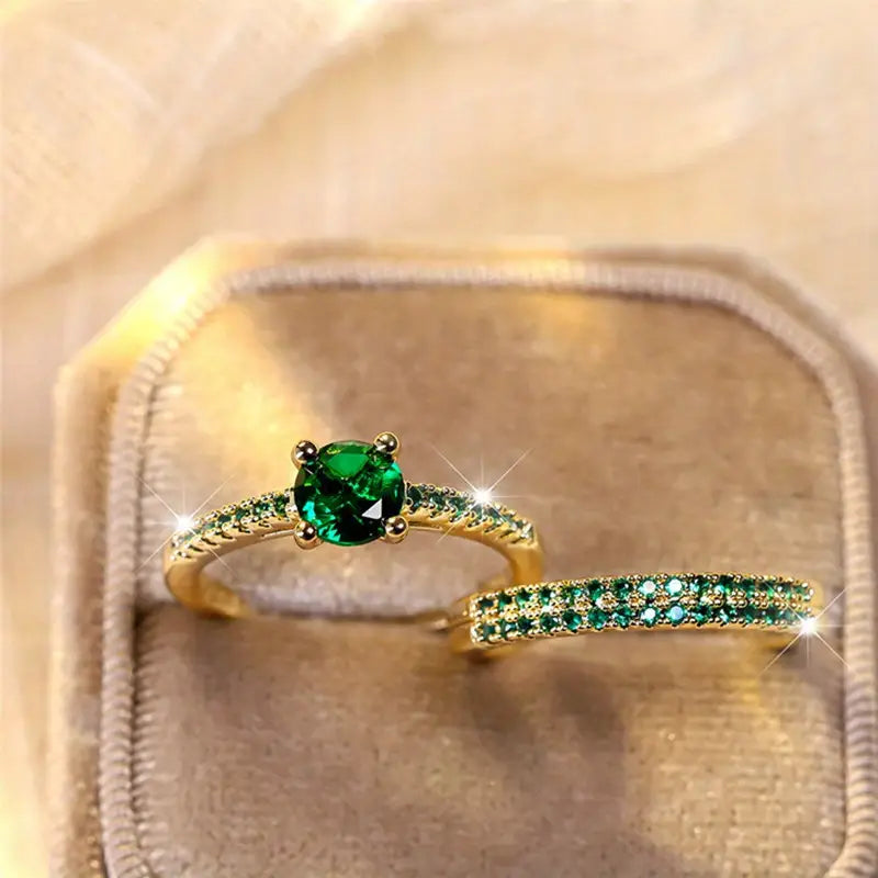 Bague double avec pierre émeraude en or