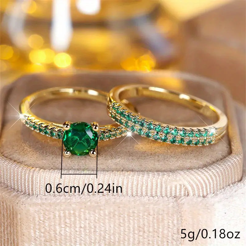 Bague double avec pierre émeraude en or
