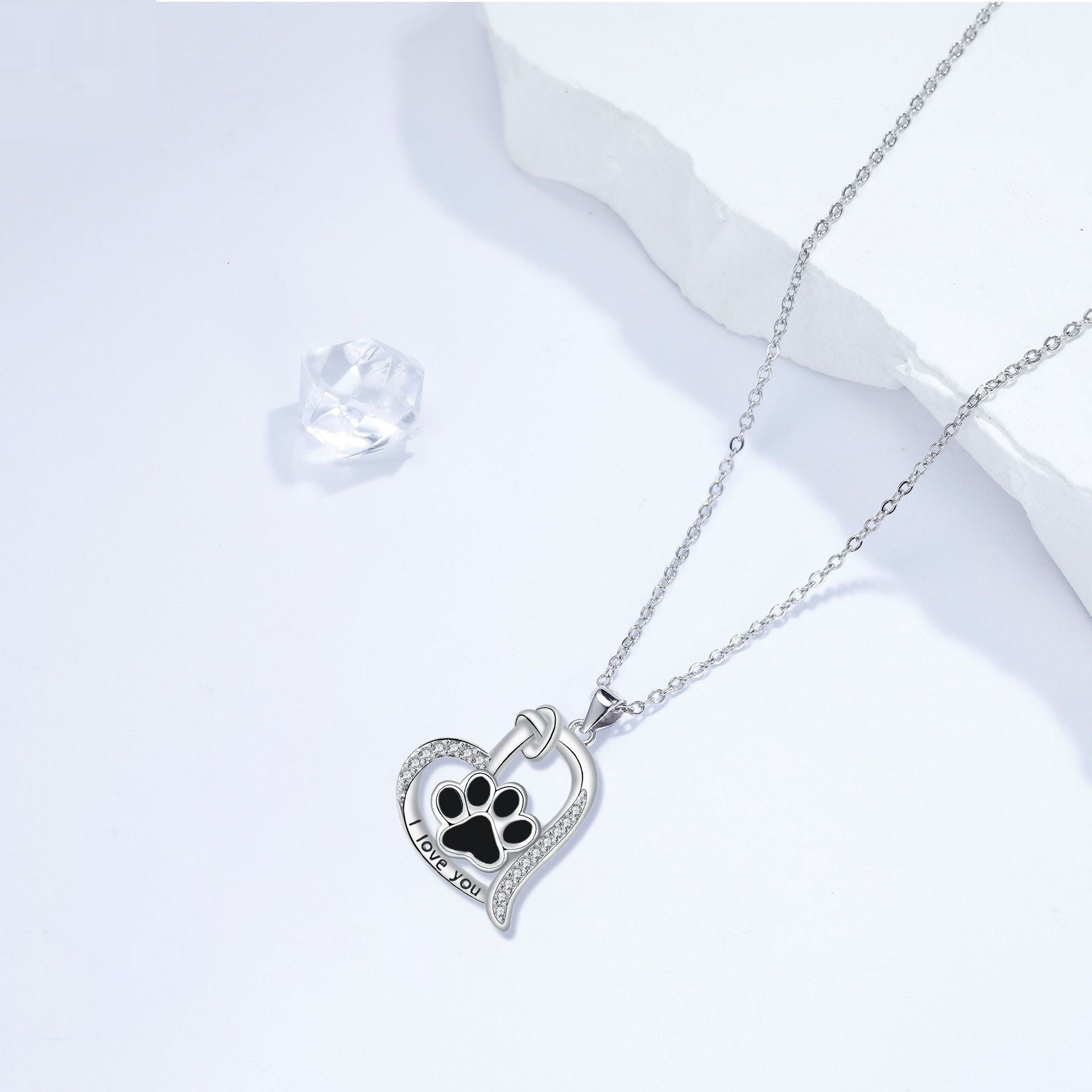 Pendentif avec empreinte de pied