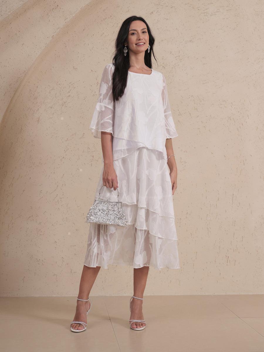 Blouse en chiffon avec des bords asymétriques élégants