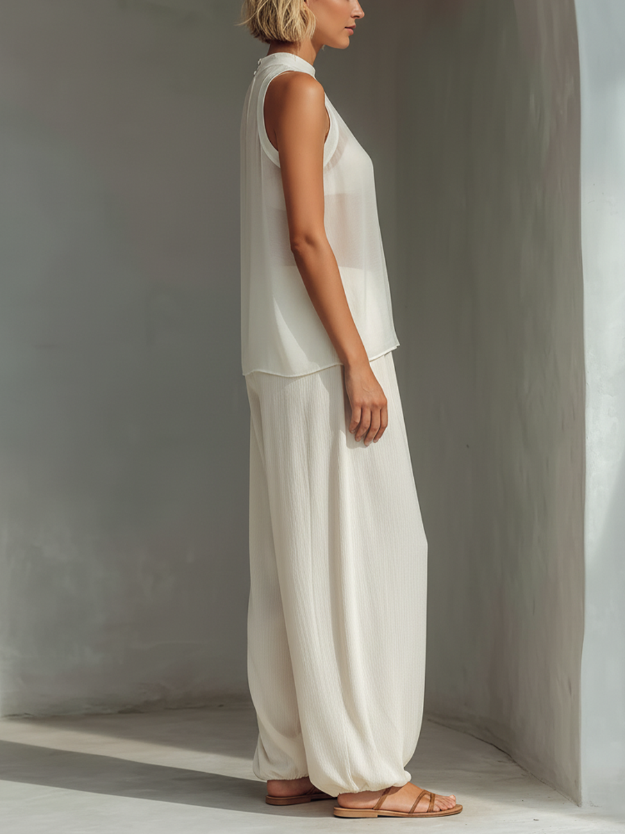 Ensemble deux pièces pour femmes en couleur crème avec un top sans manches en soie transparente et une jupe ample en tissu de coton et lin MDZ1039C4T