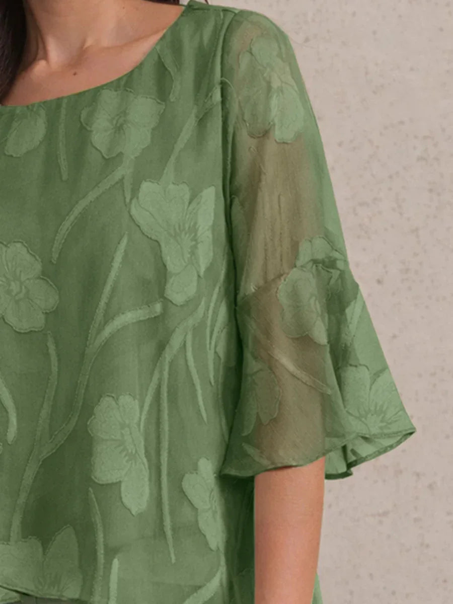 Chemise en soie avec des bords asymétriques