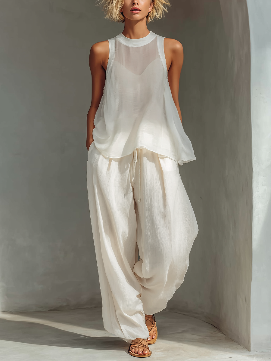 Ensemble deux pièces pour femmes en couleur crème avec un top sans manches en soie transparente et une jupe ample en tissu de coton et lin MDZ1039C4T