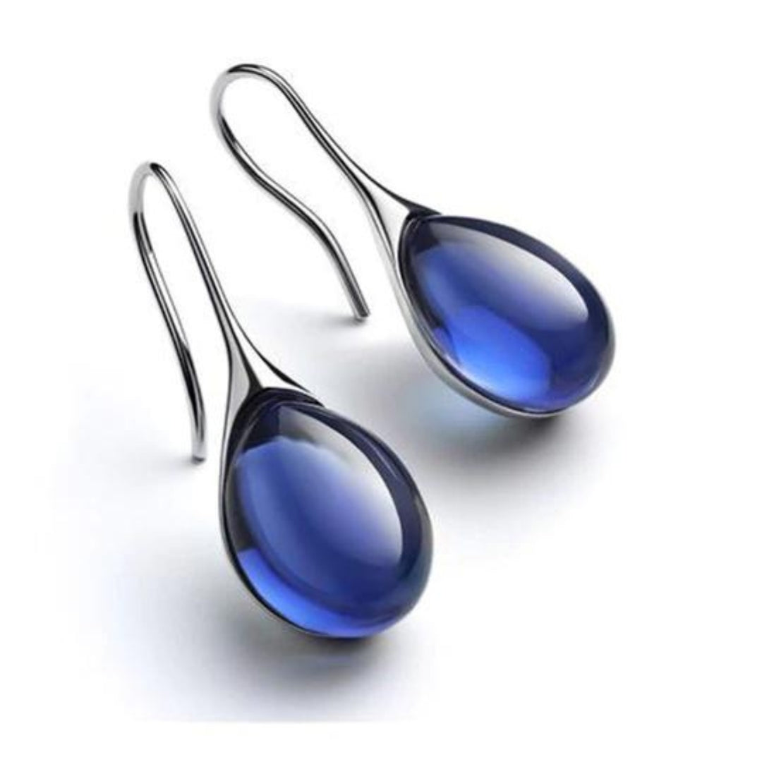 Boucles d'oreilles pendantes élégantes avec des cristaux