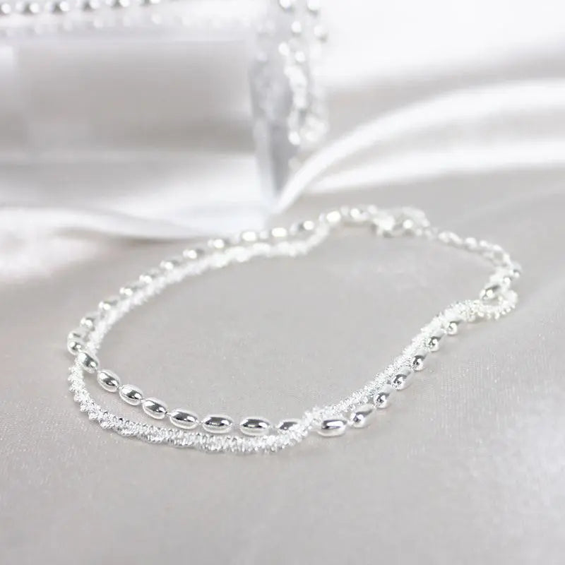 Ensemble de bracelets élégants en argent avec des pierres de zircon