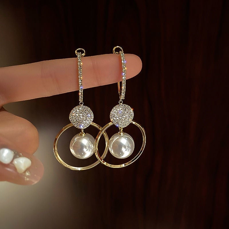 Boucles d'oreilles en perles de qualité