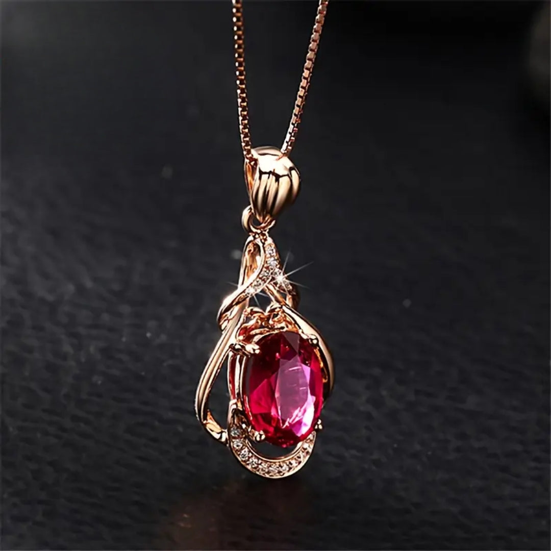 Collier élégant avec des cristaux rouges et or