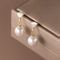 Boucles d'oreilles en argent élégantes avec perle