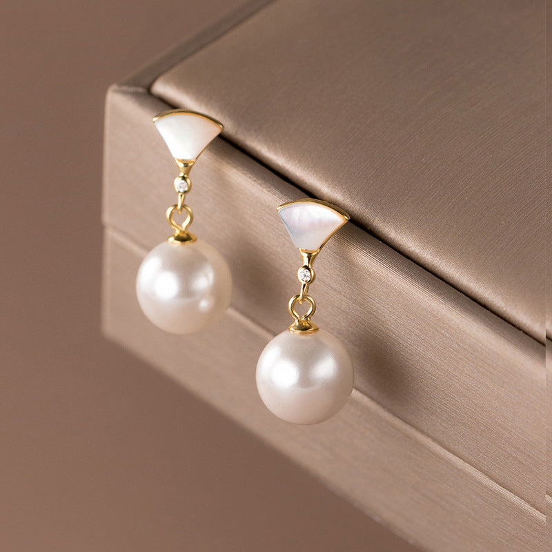 Boucles d'oreilles en argent élégantes avec perle