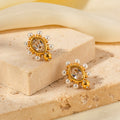 Boucles d'oreilles en or avec perle