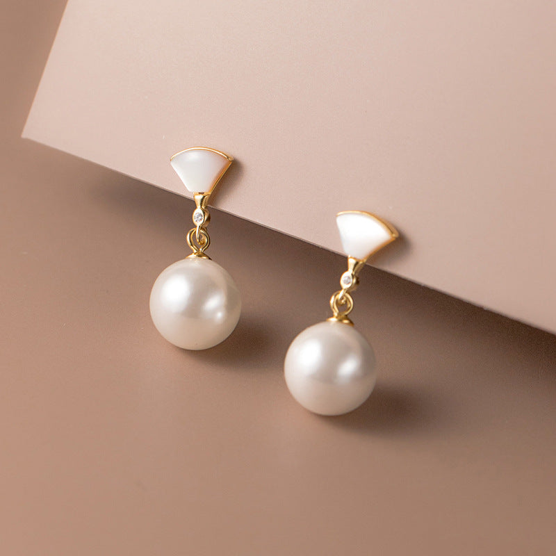 Boucles d'oreilles en argent élégantes avec perle