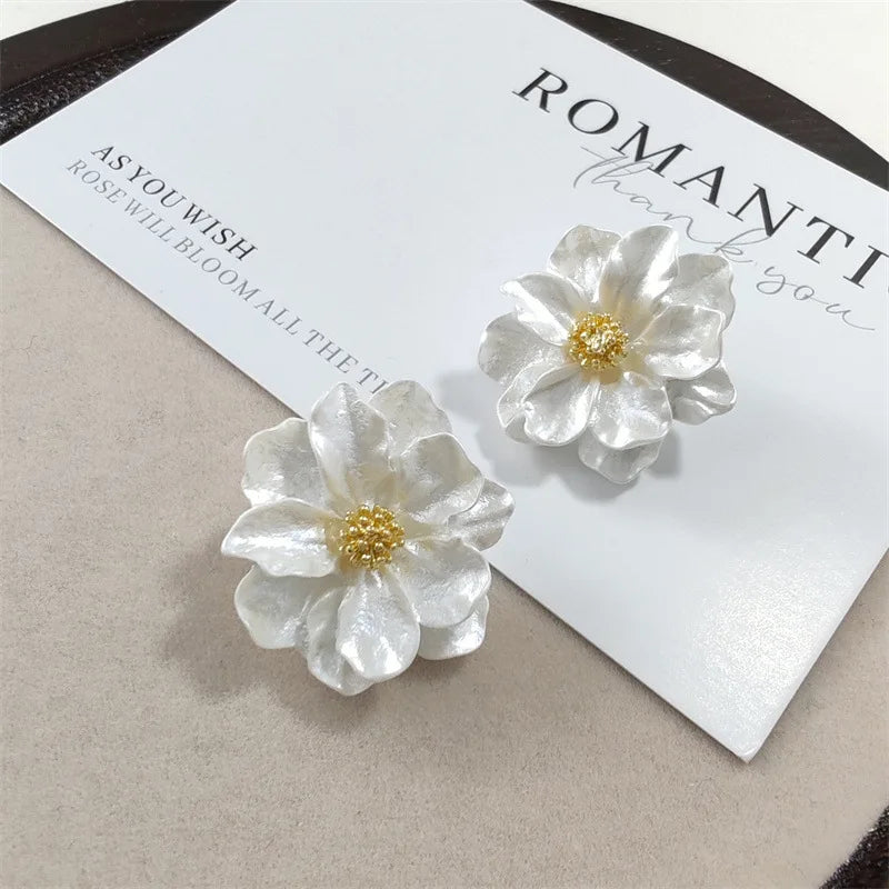 Boucles d'oreilles en acrylique blanc élégantes