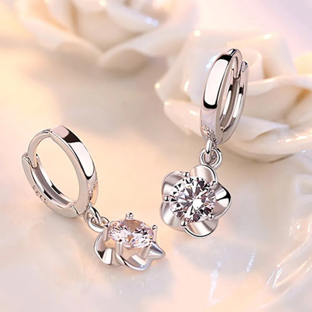 Boucles d'oreilles en argent sterling avec des zirconiums violets et blancs