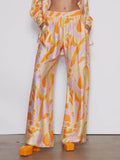 Pantalons larges avec imprimé graphique plage tropicale