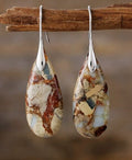 Boucles d'oreilles chics avec pierre elliptique
