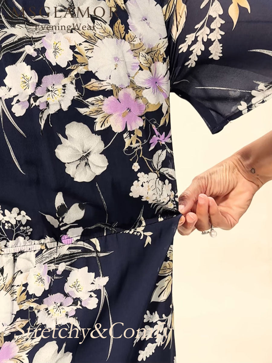 Robe midi en chiffon à fleurs avec décolleté en V et zips