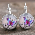 Boucles d'oreilles vintage en papillon avec des cristaux ronds
