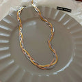 Collier élégant en or et en argent